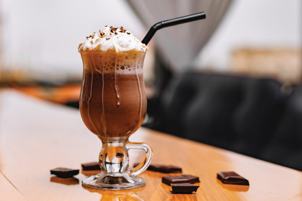 cold coffee which is filled with ice scream and chocolate toppings